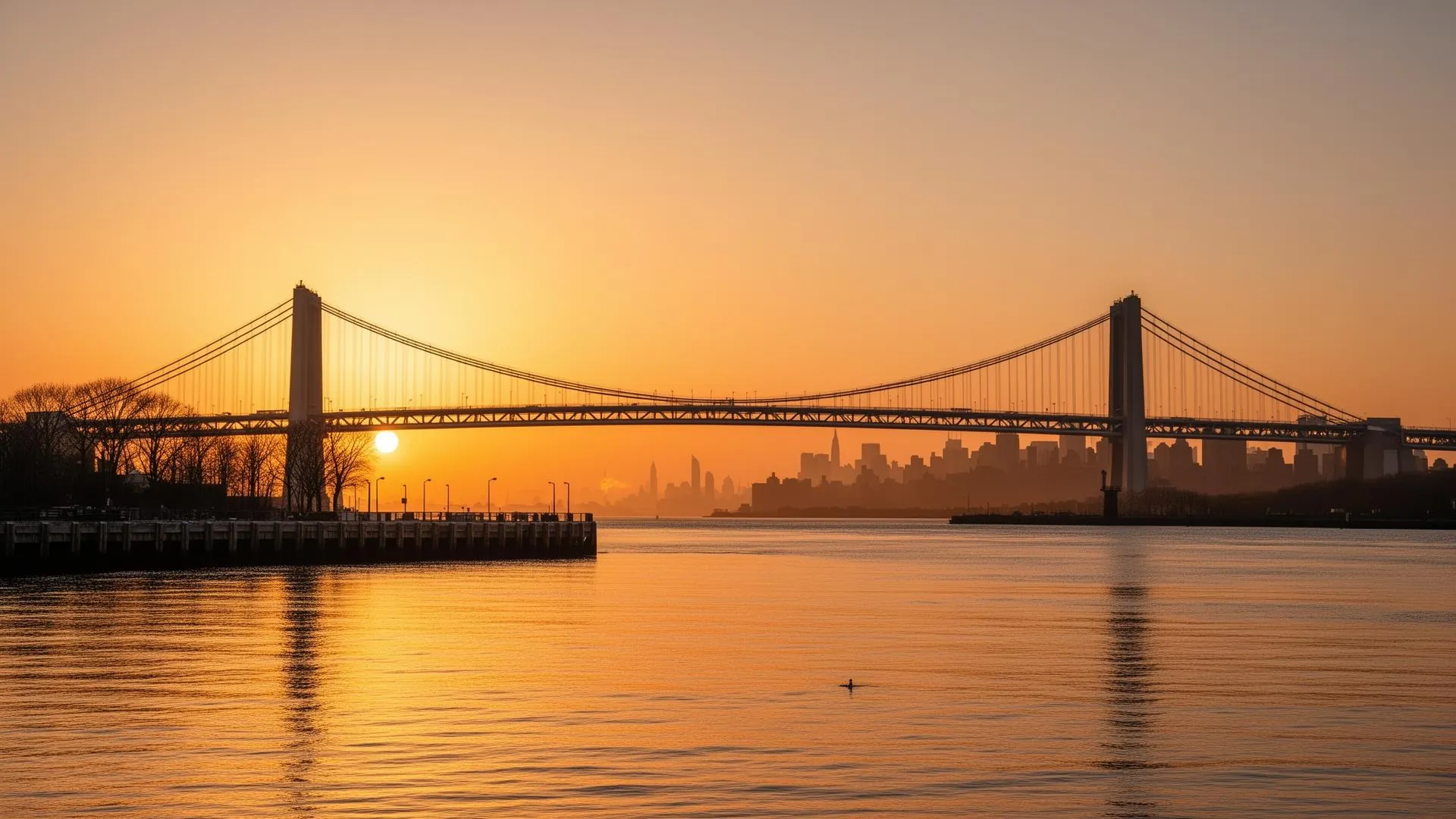 Verrazzano-Narrows Bridge at sunset over Brooklyn waterfront
